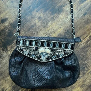 Chicos faux leather/suede embellished handbag.